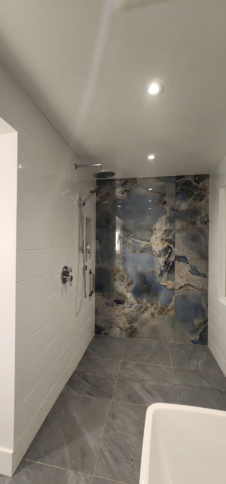 Artistic Feature-Wall Bathroom installed by RENOGUYS