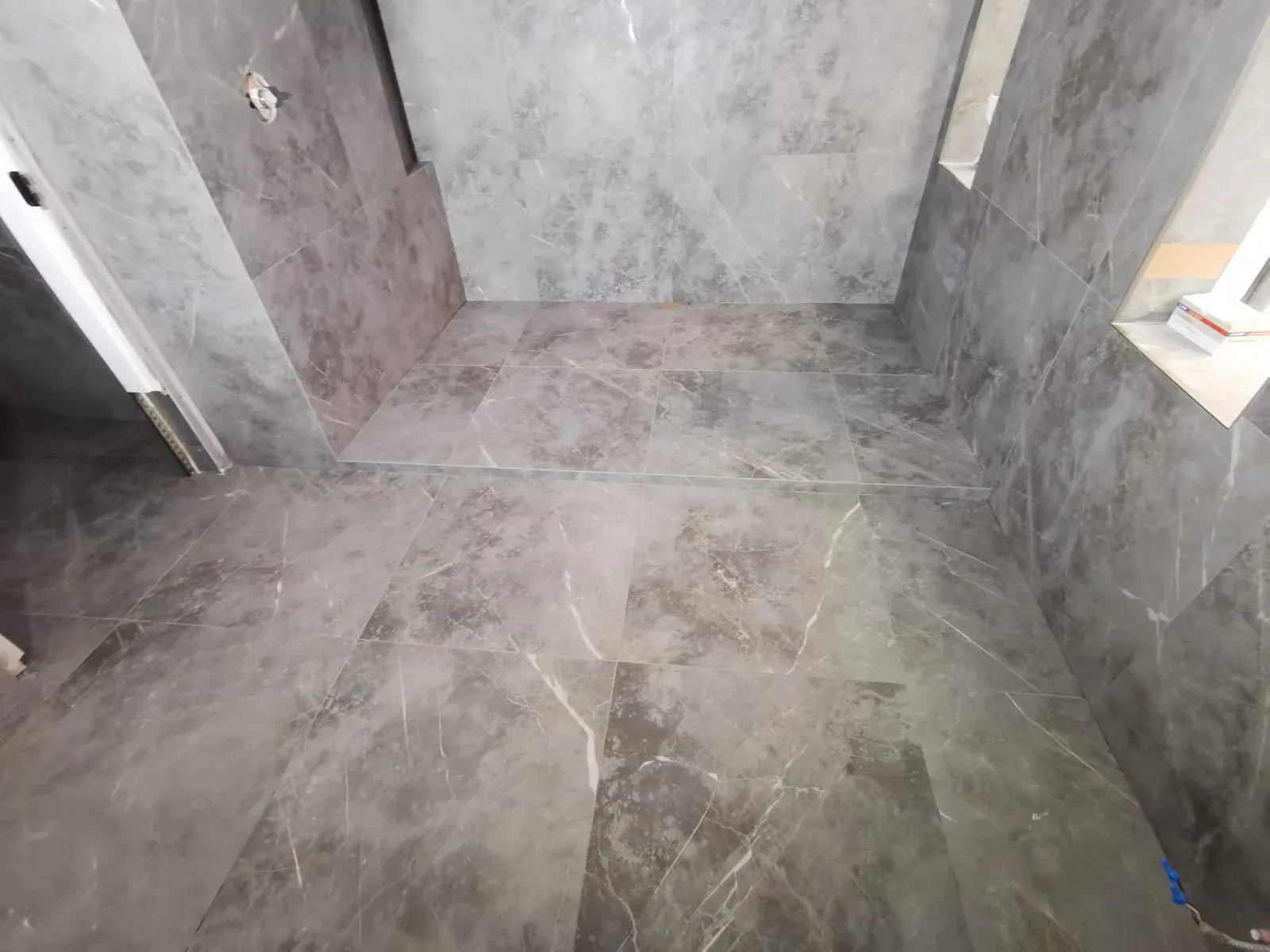 Large-Format Stone Shower completed by RENOGUYS