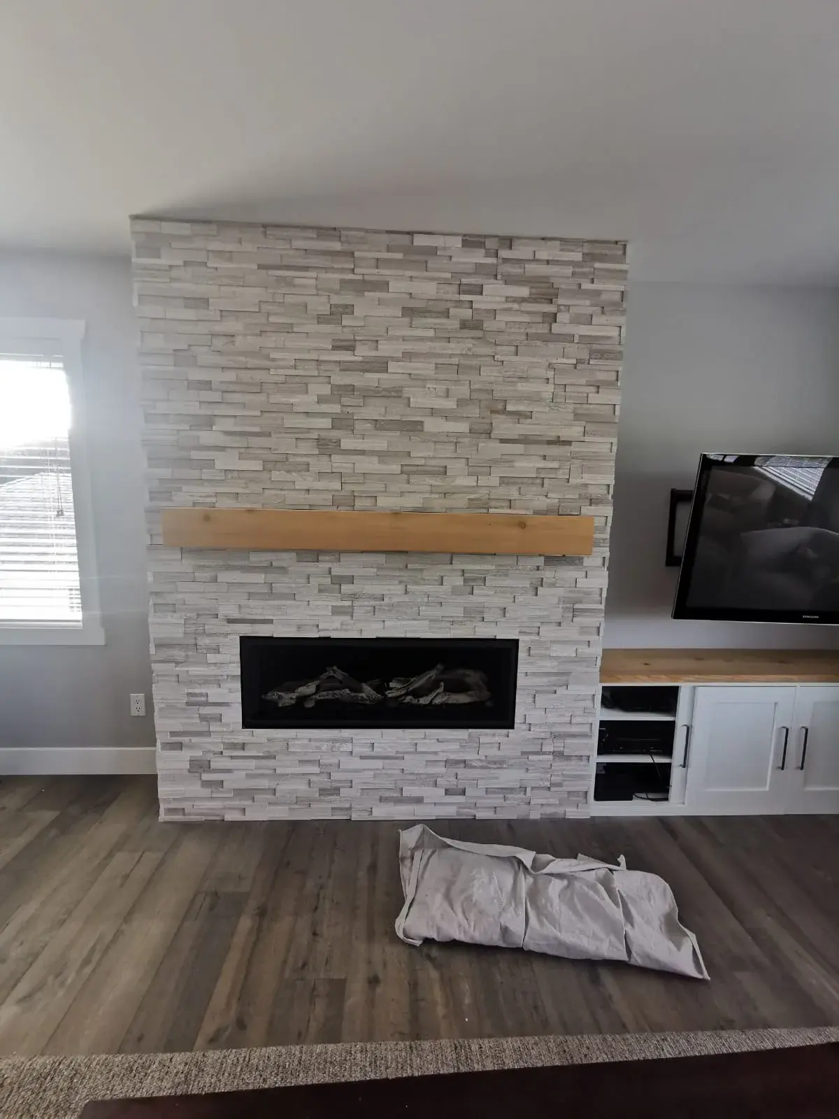 Stacked Stone Fireplace by RENOGUYS