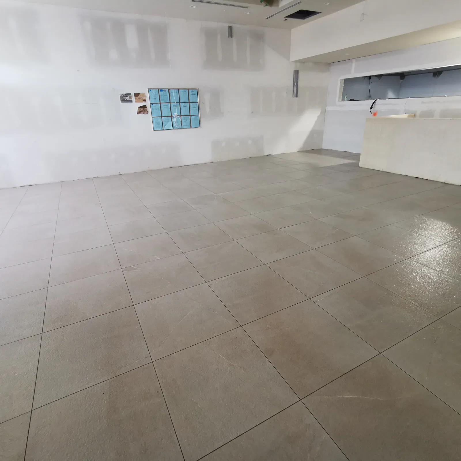 Commercial Large-Format Tile completed by RENOGUYS