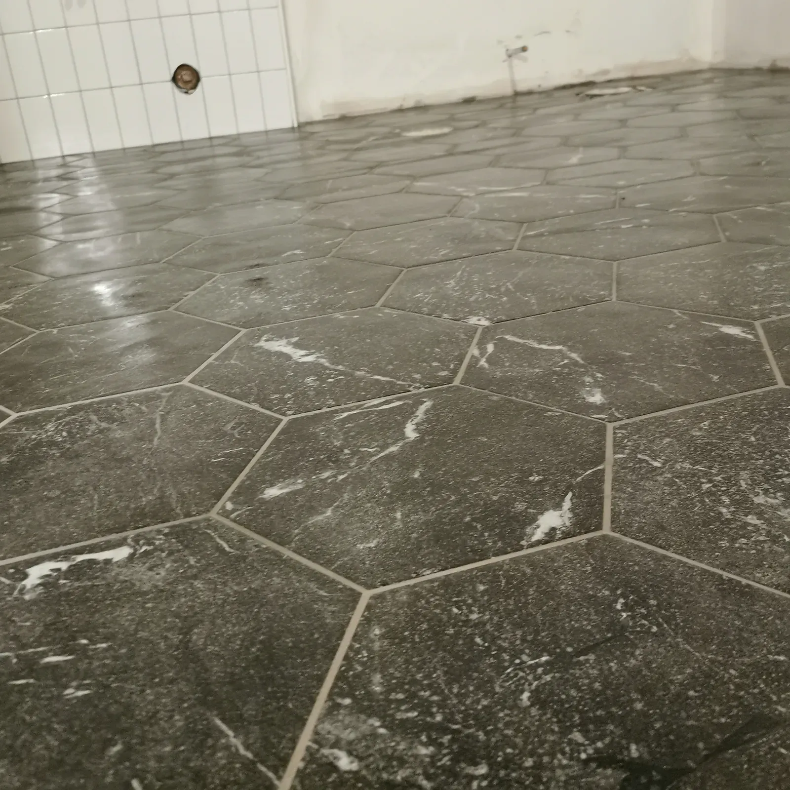 Hex Stone Flooring installed by RENOGUYS