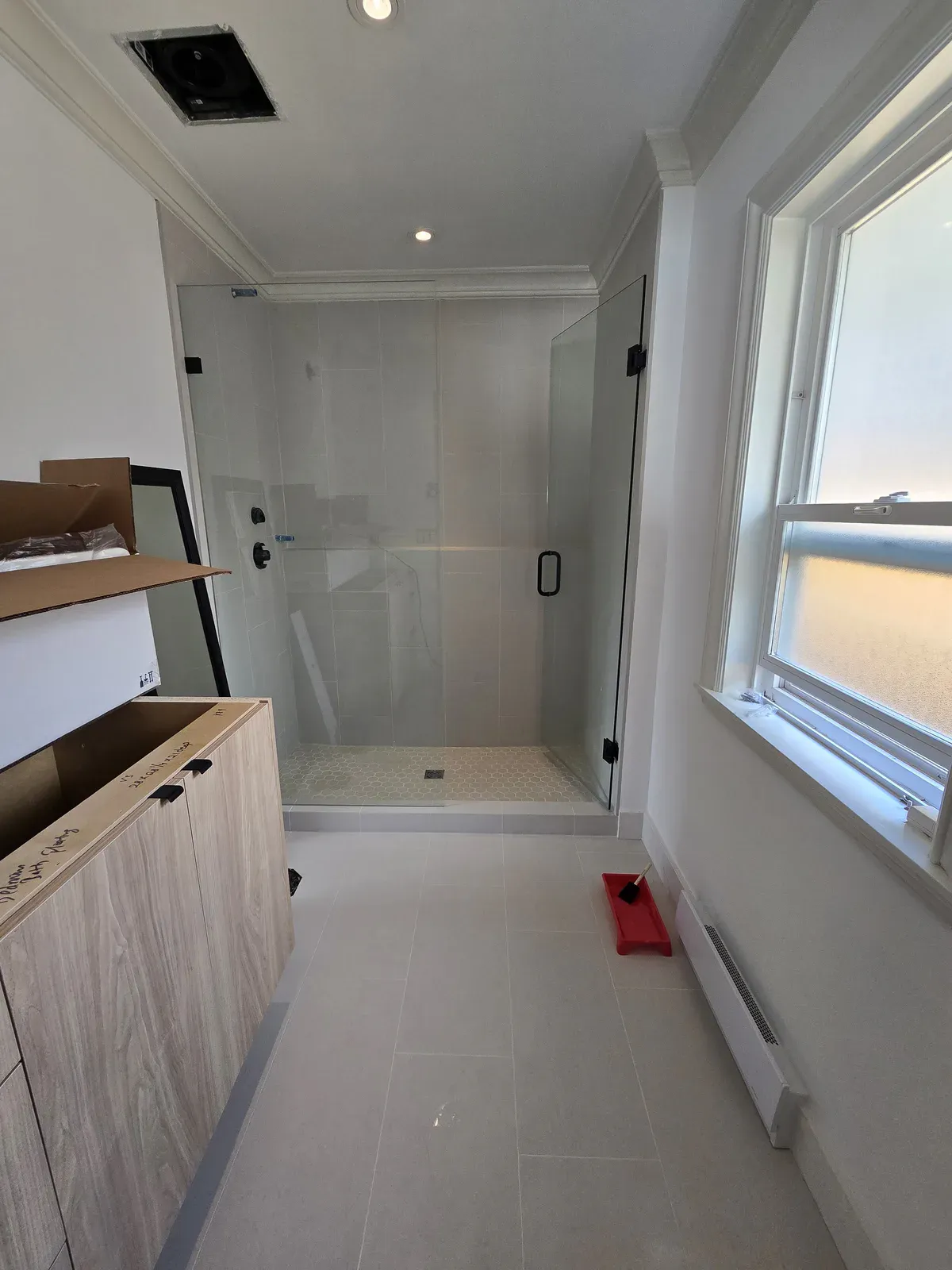 Bright Glass-Enclosed Shower by RENOGUYS